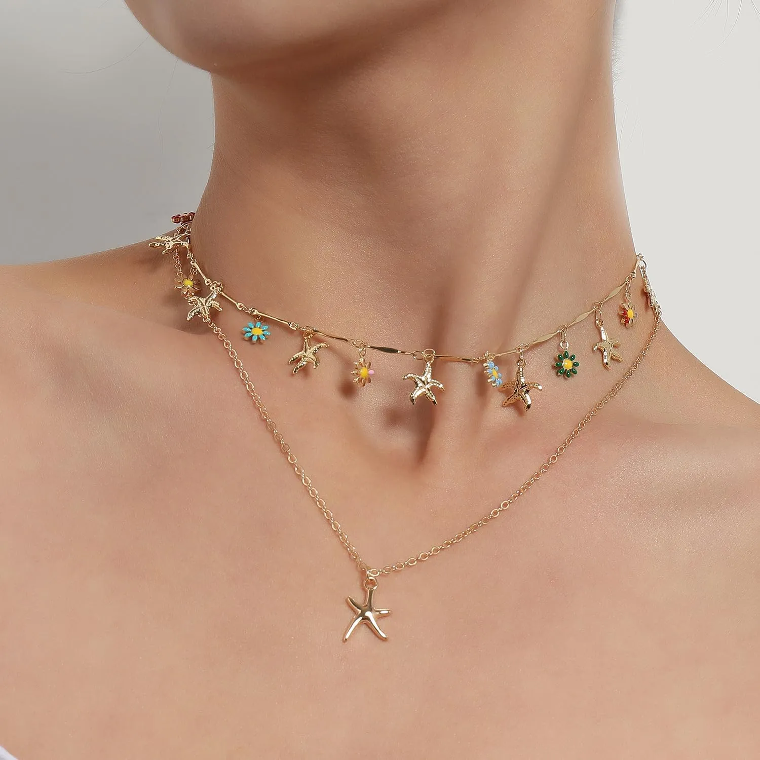 NIQIPOK Beach Necklaces for Women Layers Gold Daisy Flower Starfish Shell Necklace 14K Gold Plated Layered Boho Summer Seashell Beach necklace Jewelry